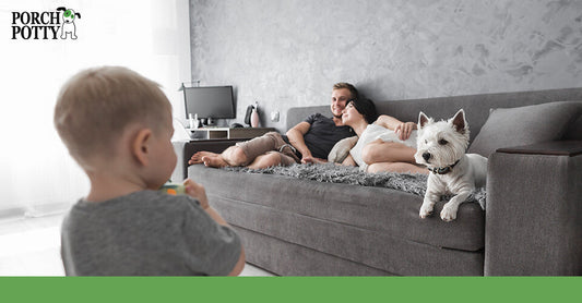 A family relaxes with their new puppy